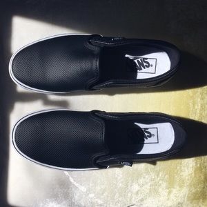 Vans black leather slip on